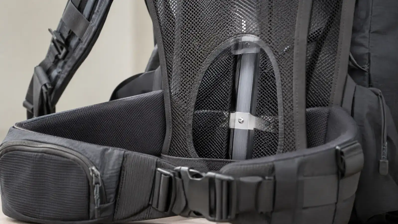 Close-up of the TETON Scout 55L internal frame and hip belt showing the suspension system detail